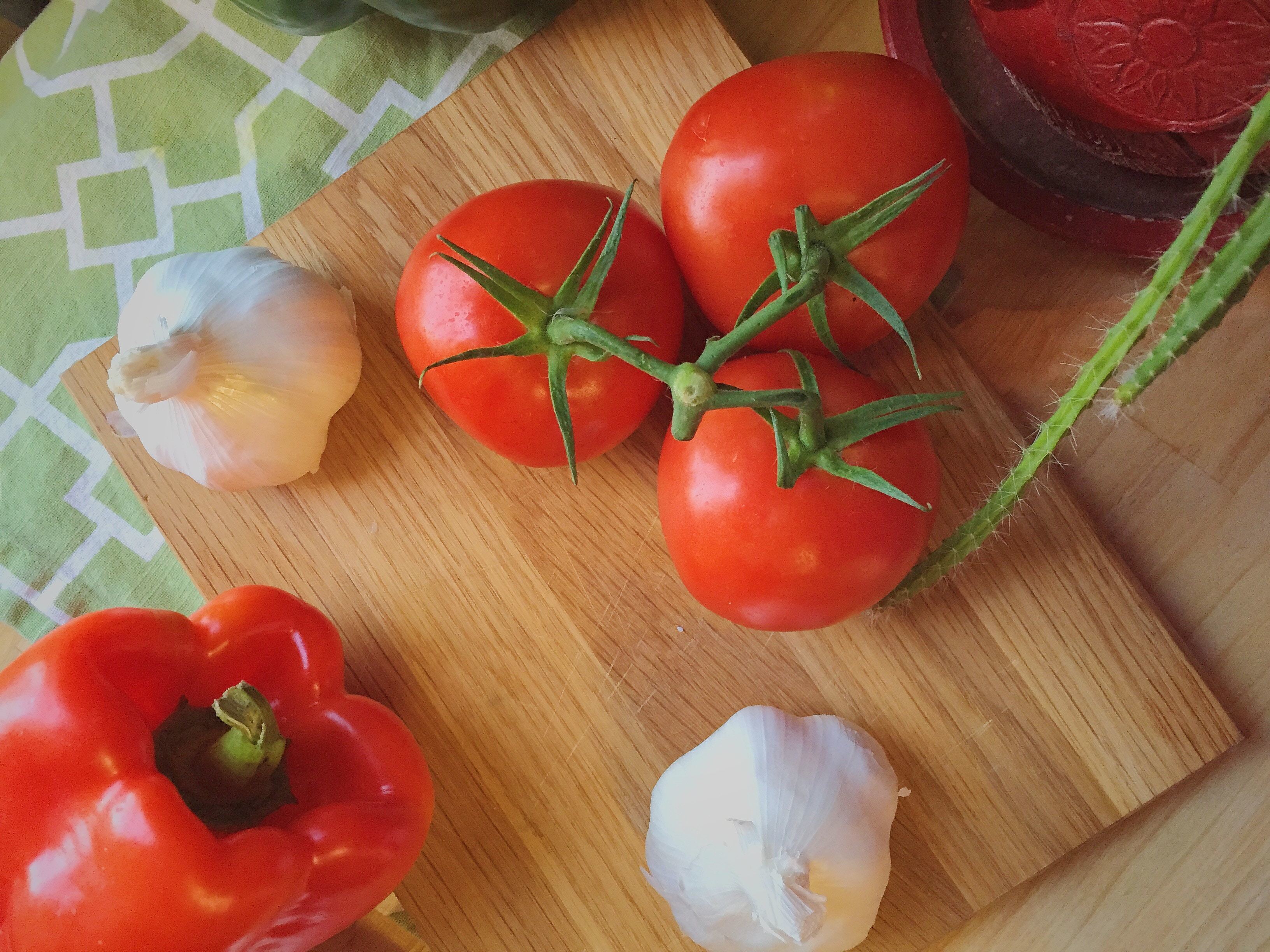 Raw Leafy Greens, Red Bell Peppers & Tomatoes for Collagen Production