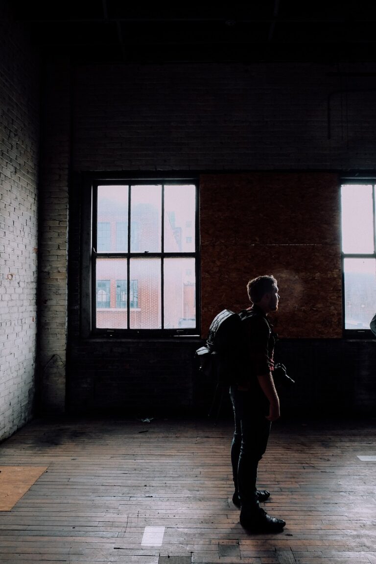 A figure silhouetted against a window