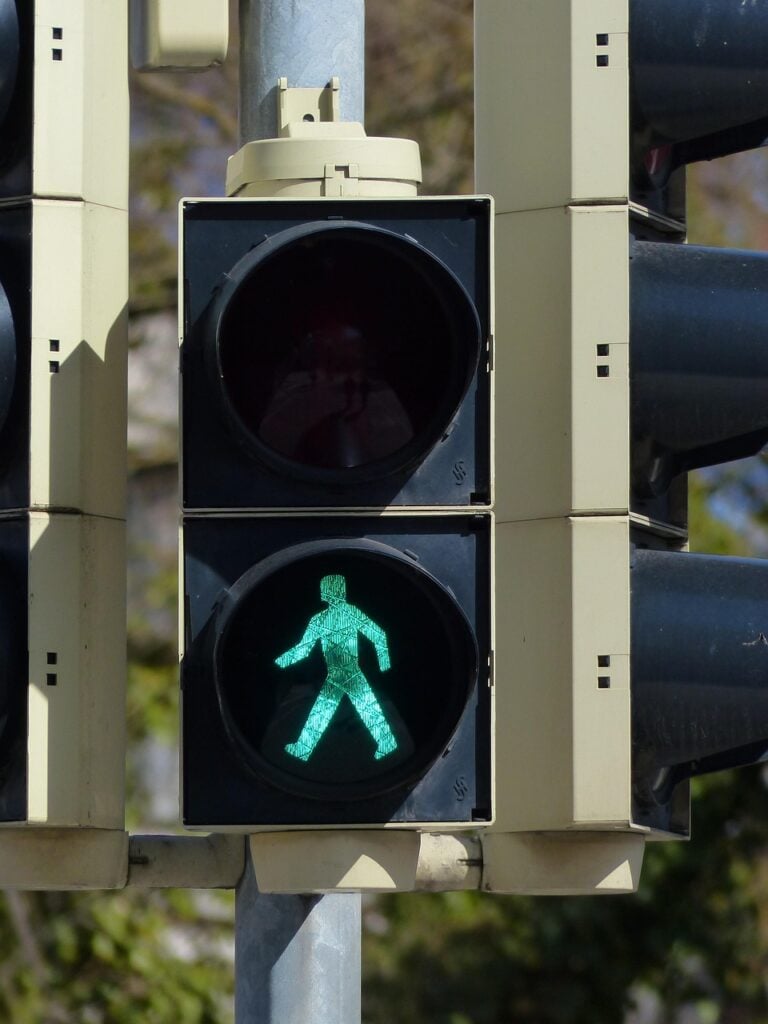 A man running on an open road at first light