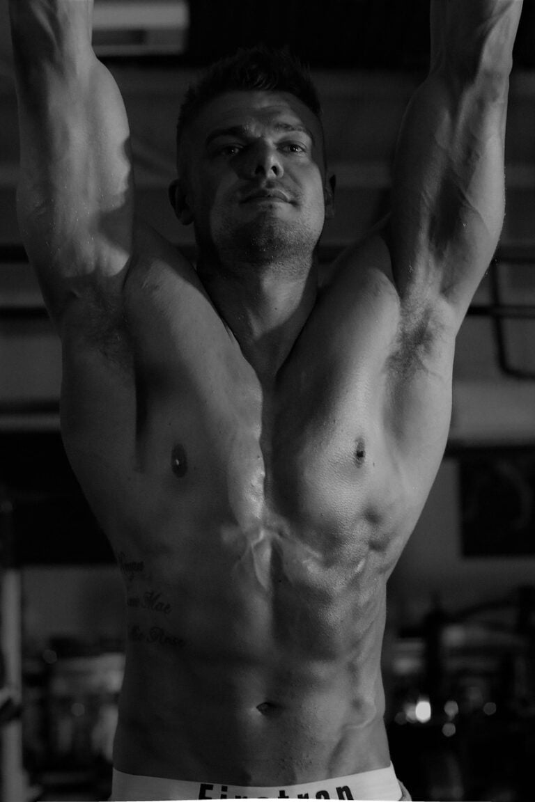 A boxer drilling in an empty gym