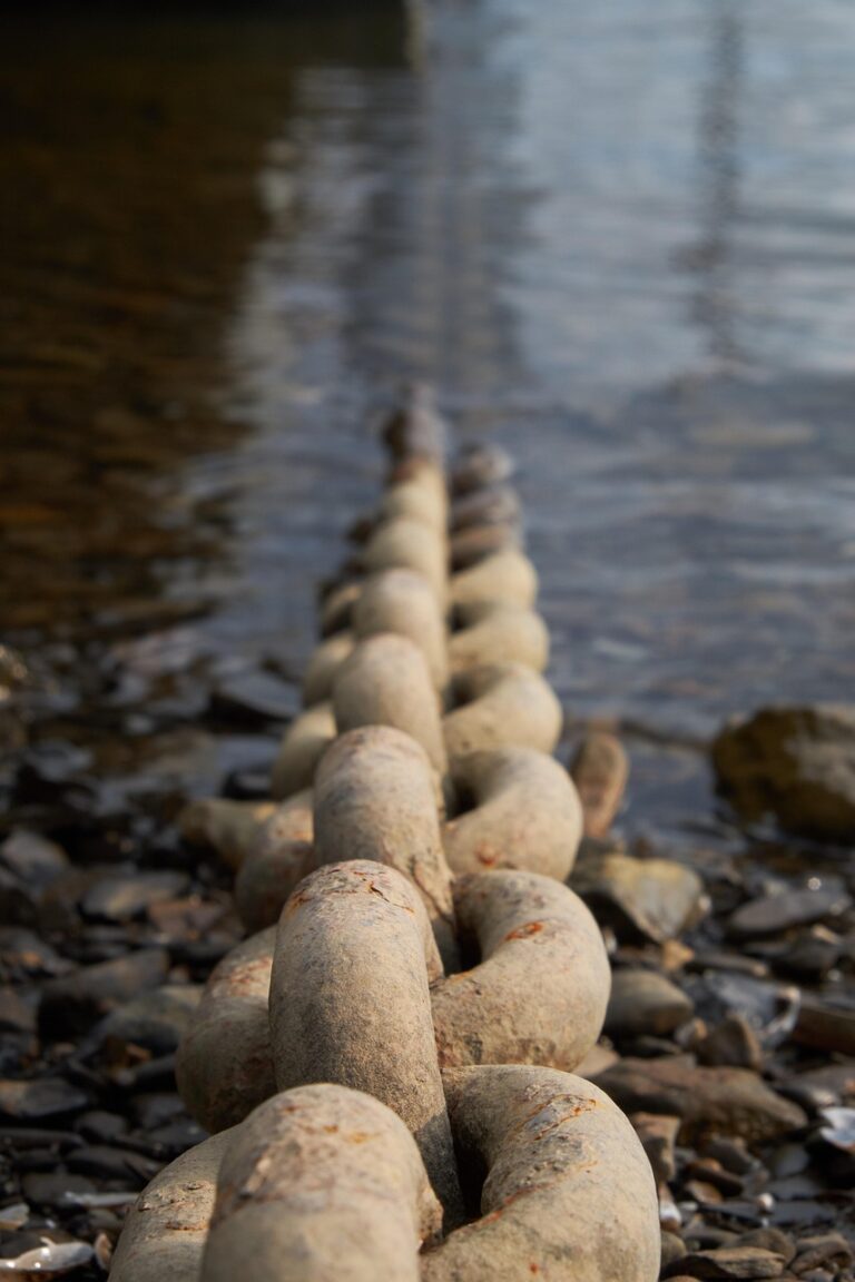 A heavy chain at its limit