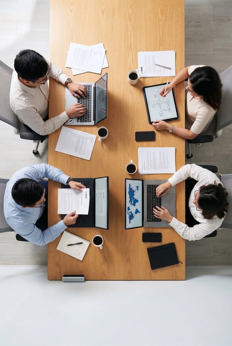 A man working alone at a desk