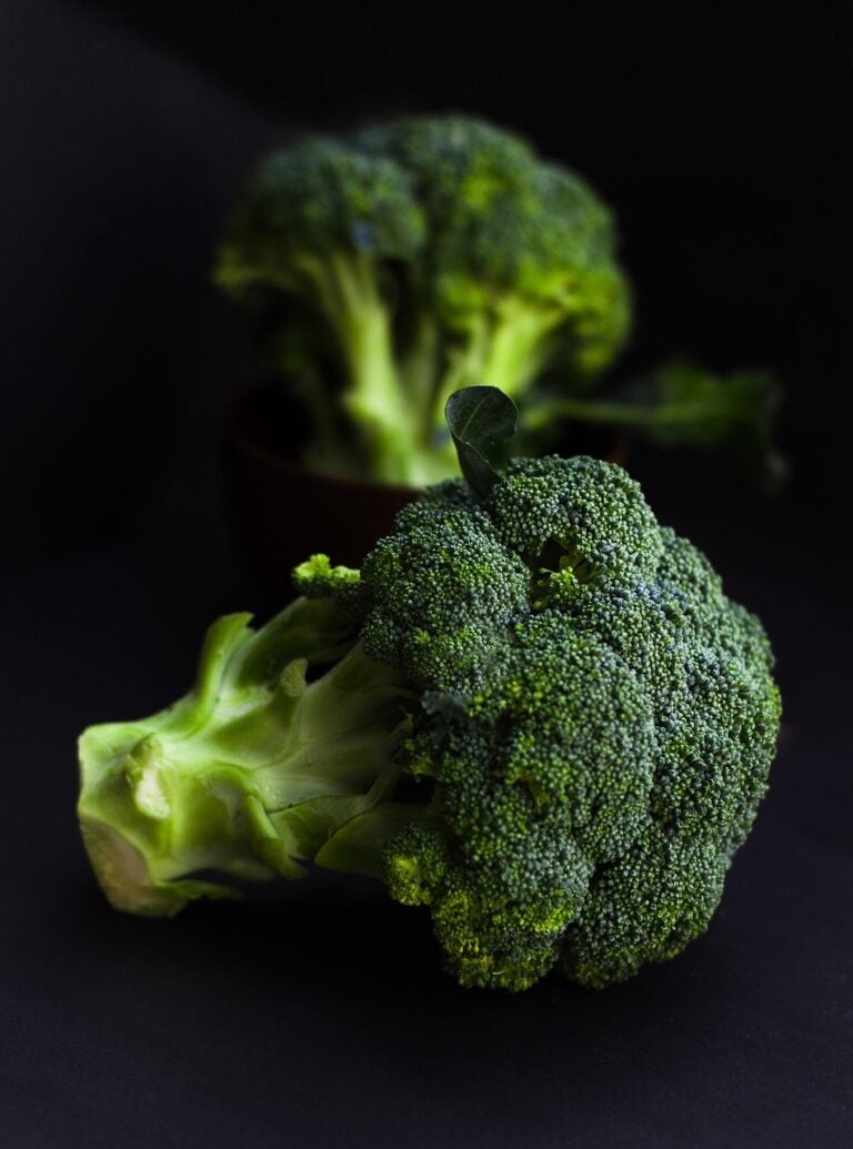 Whole vegetables on a wooden board