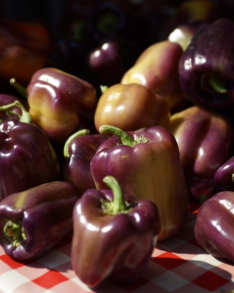 Whole vegetables on a wooden board