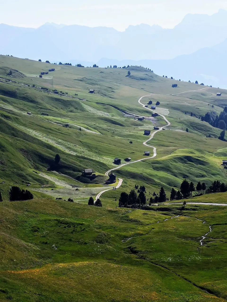 Man hiking a mountain trail, symbolizing sustained practice in turning setbacks into fuel