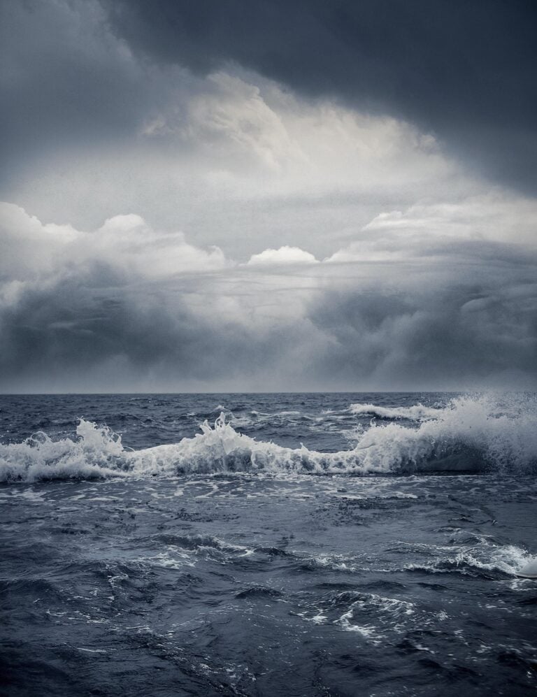 Heavy waves breaking in an open sea