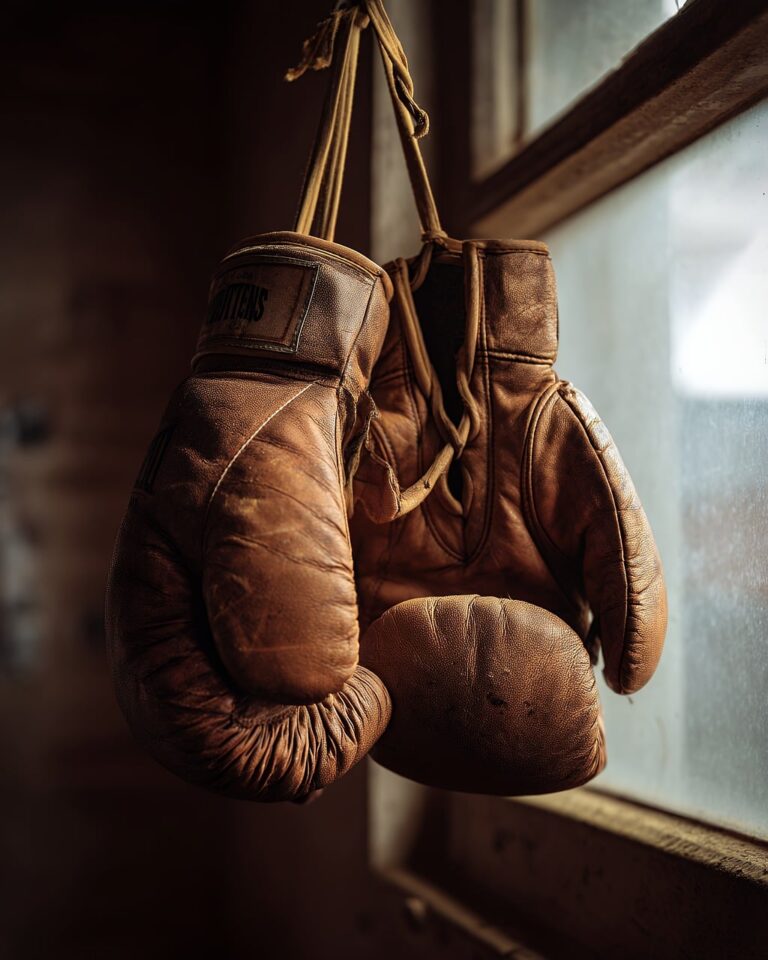 A boxer drilling in an empty gym