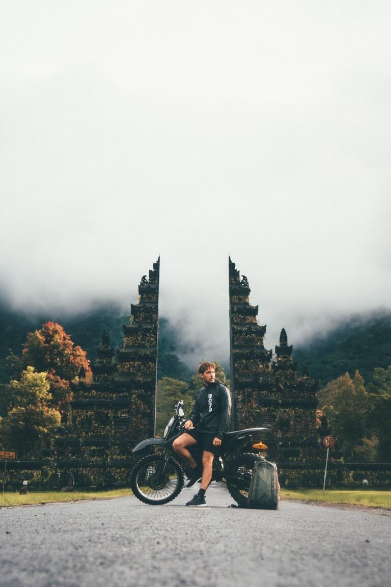 A runner on empty road before sunrise