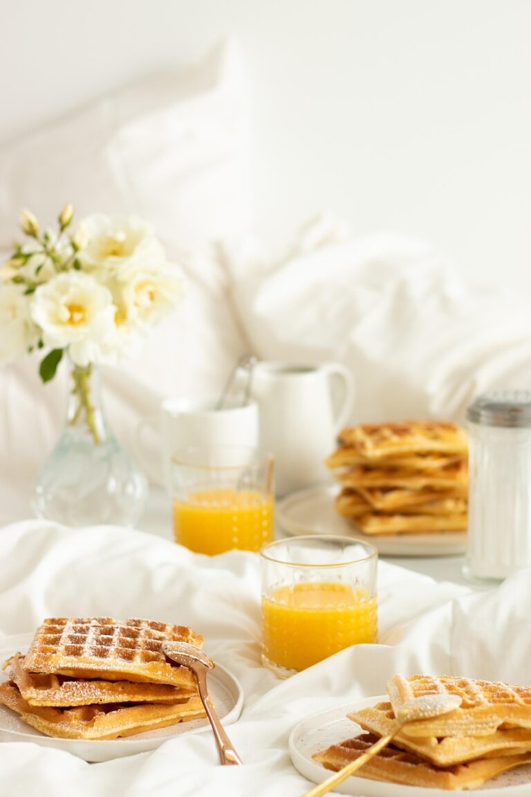 A bed in low morning light