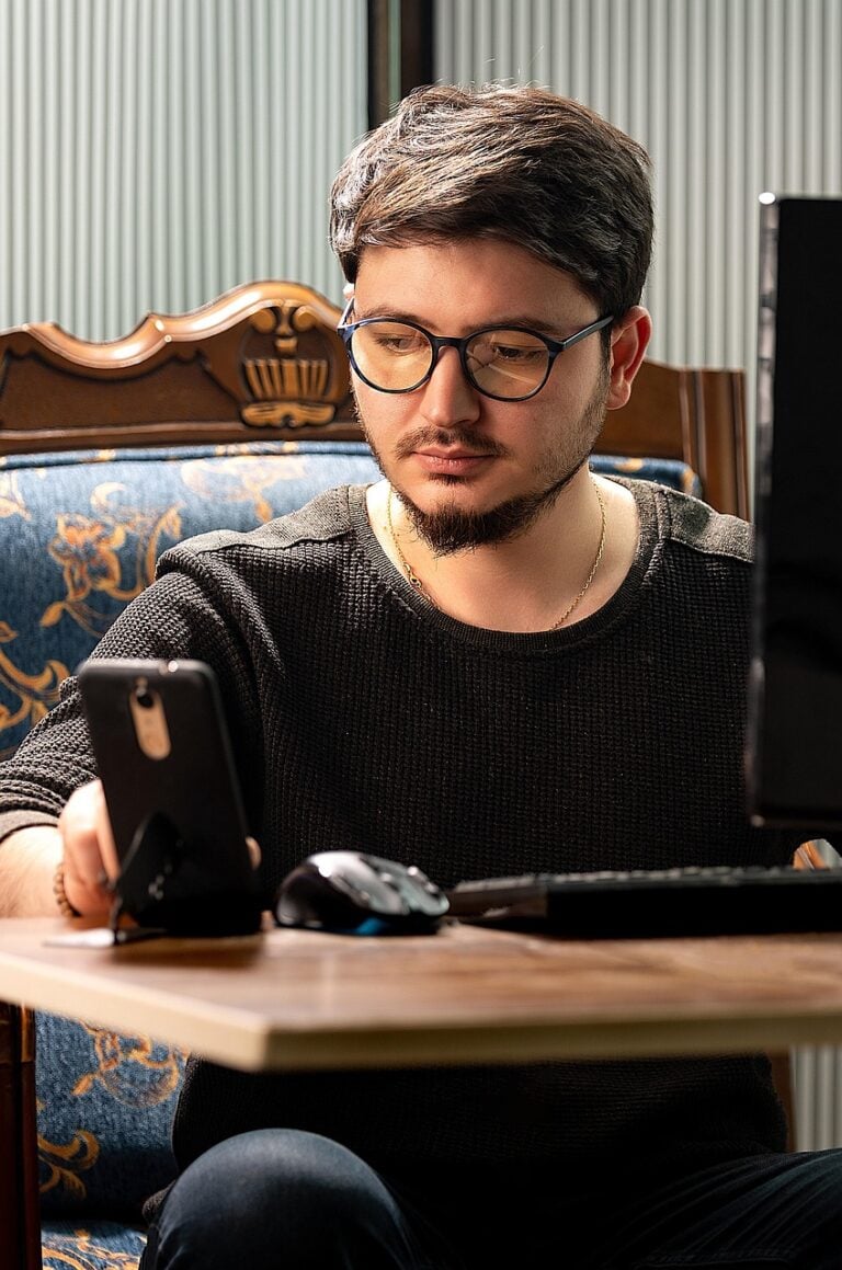 A man concentrating over paperwork