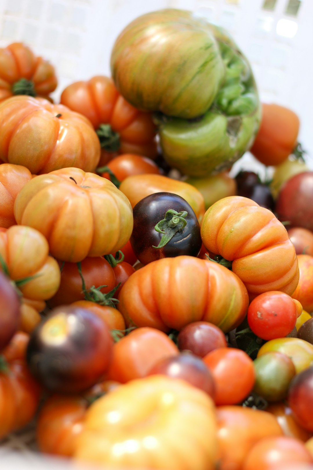 green and orange round fruits - Antioxidants in Fighting Inflammation