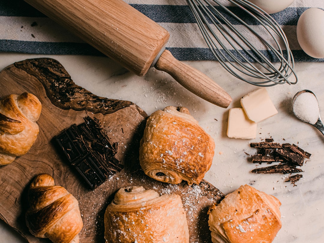 brown wooden rolling pin beside brown wooden rolling pin - Sugar Fuels Inflammation