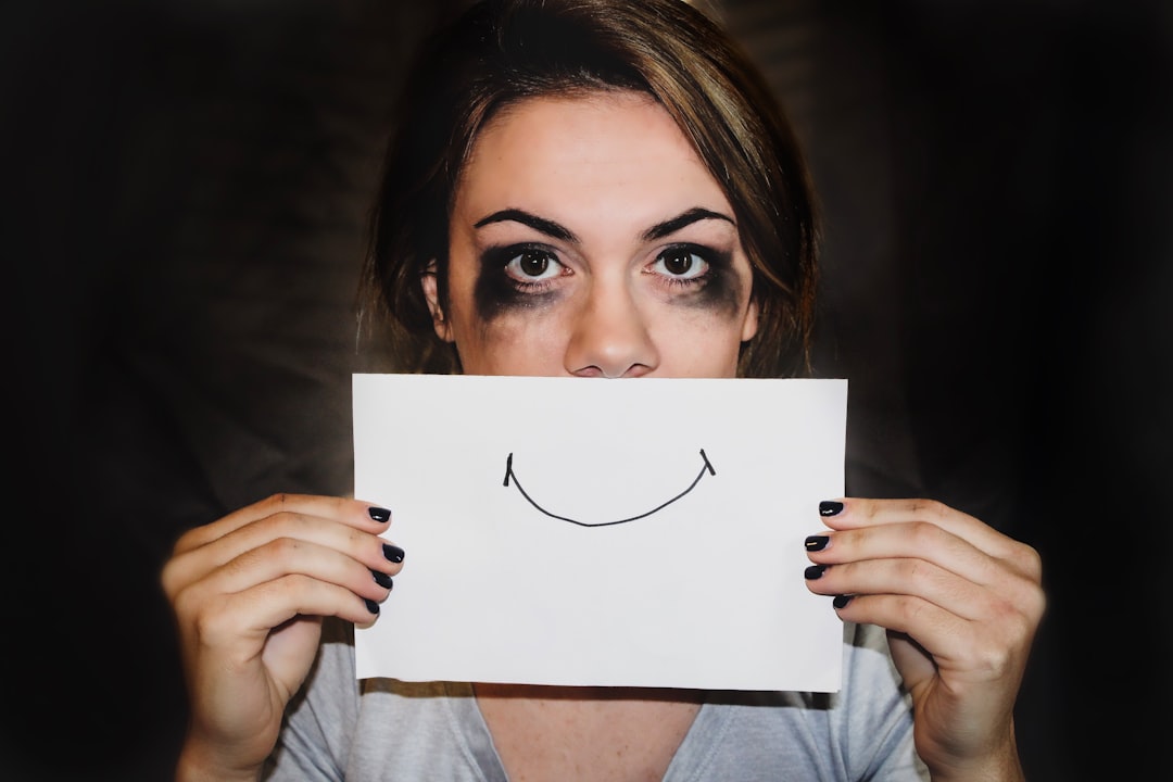 person holding white printer paper- Sleep Deprivation