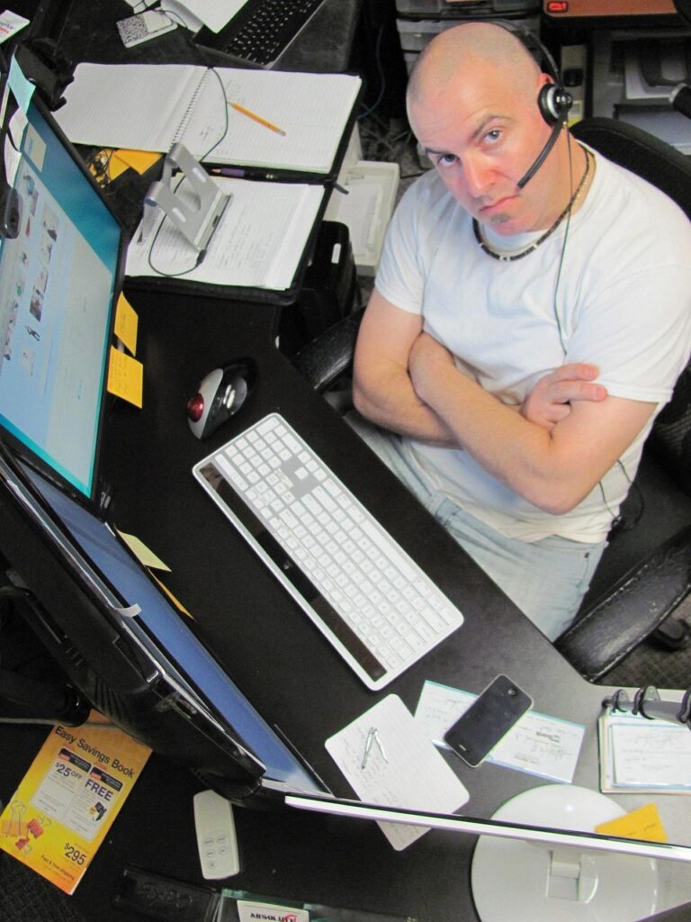 A man concentrating over paperwork