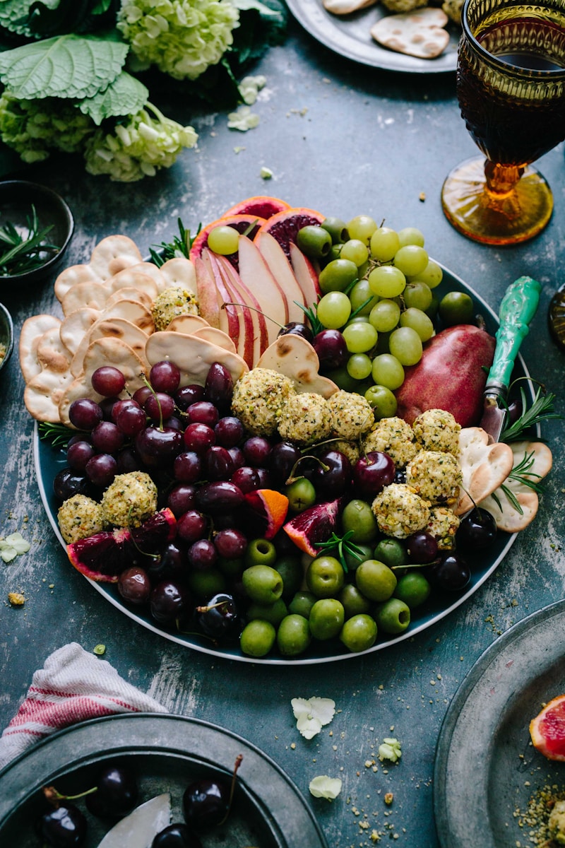 assorted fruits on silver round plate Nutritional Supplements