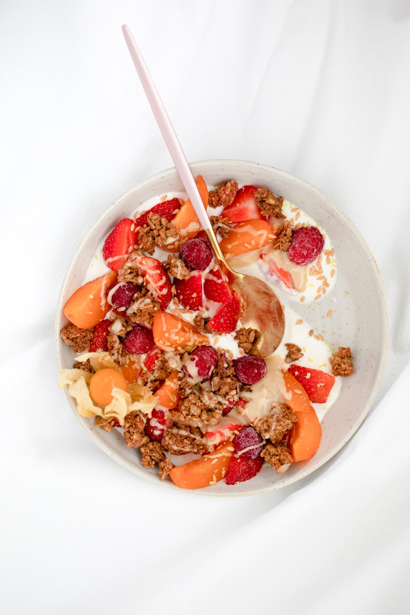 cereal with sliced strawberries and cream on white ceramic bowl Omega-3 and Brain Health