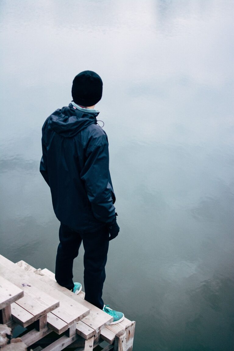 A man looking out at first light