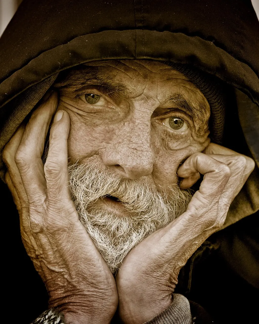 Man writing thoughtfully in a journal, symbolizing the ongoing-conversation practice for lasting relationships