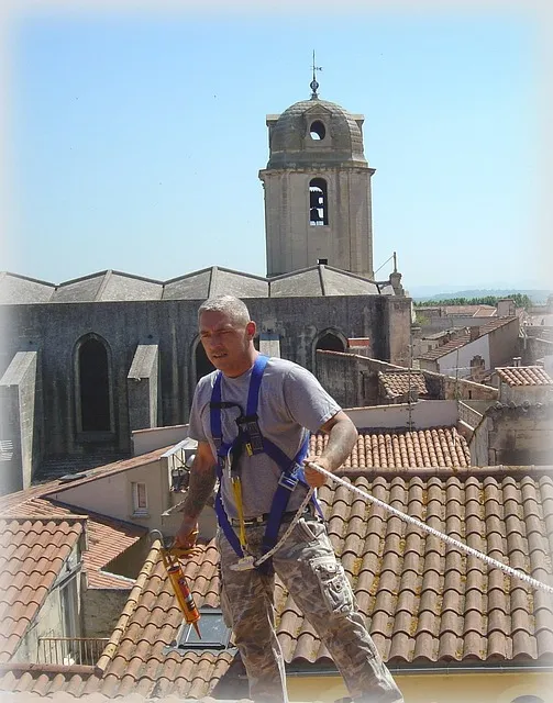 man working with focused attention on a craft