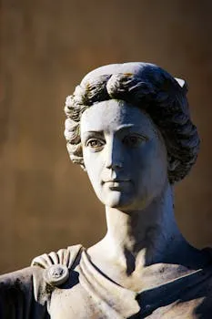 A detailed close-up of a marble statue representing a classical Roman