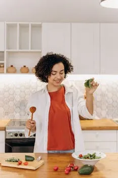 Meal preparation demonstrating intentional cooking within an eating window