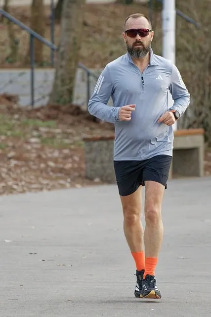 man running in nature representing Geronimo's physical endurance and daily