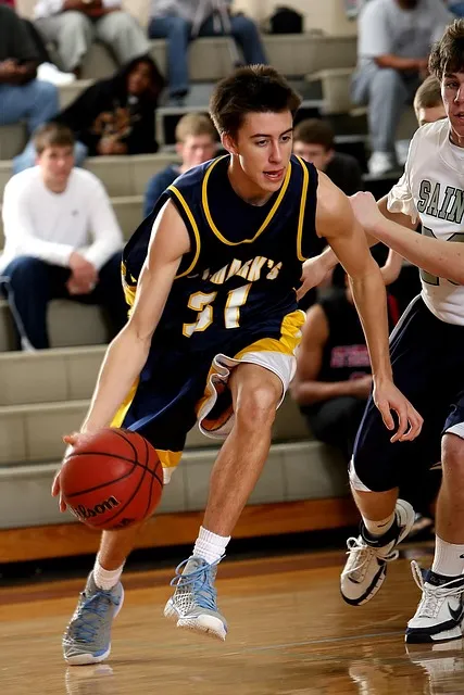Basketball player in motion during a competitive game