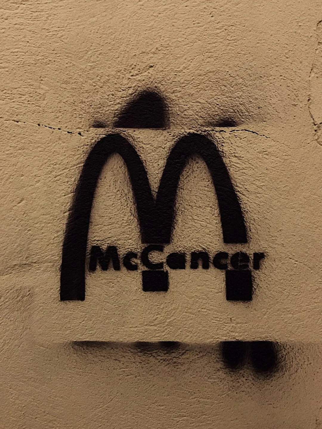 a picture of a mcdonald's logo on a wall
