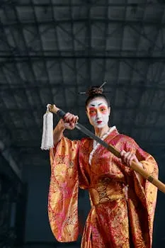 A striking portrait of a geisha in a colorful kimono wielding a katana in an