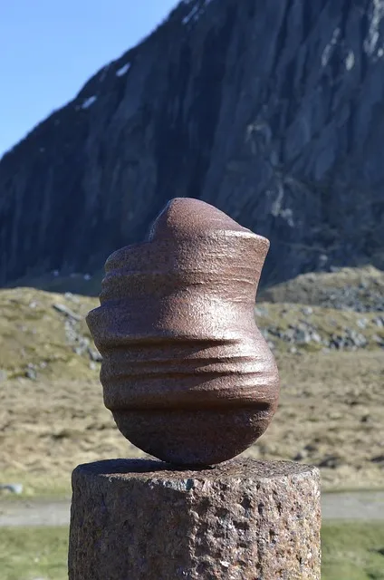 Philosophical head sculpture Norway coast Lofoten representing Stoic thought