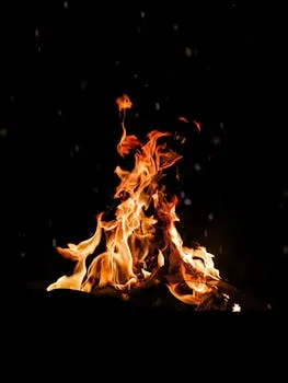 A bonfire burning bright in the dark