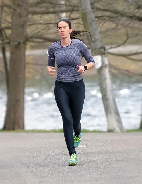 woman running outdoors during 75 Hard challenge