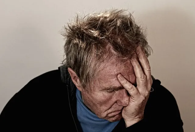 Man with determined expression taking control of emotional awareness
