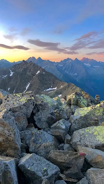 Mountain sunrise hiker representing declutter motivation and fresh starts