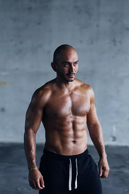Man displaying strength and power through physical training