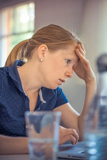 Woman frustrated by the gap between feminist ideals and relationship reality