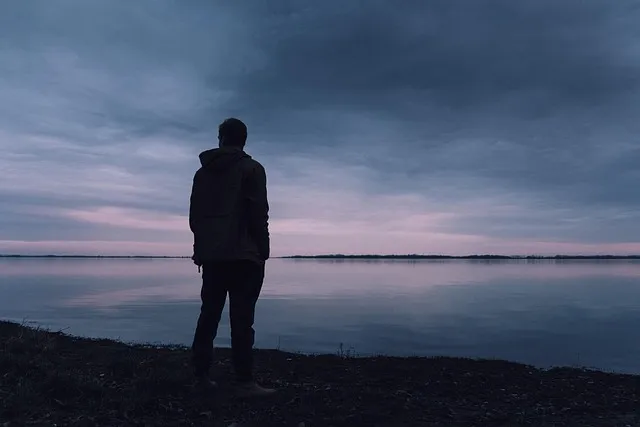 A man in reflection — choosing depth over the illusion of freedom