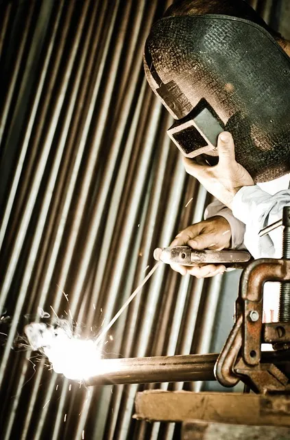 Man working with his hands in a workshop discovering identity through action
