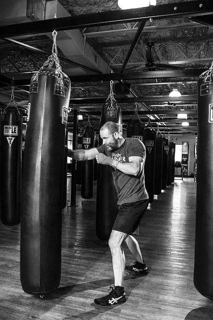 Man at a heavy bag discovering that the body processes what the mind cannot