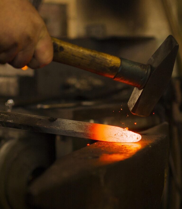 A forge burning at working heat