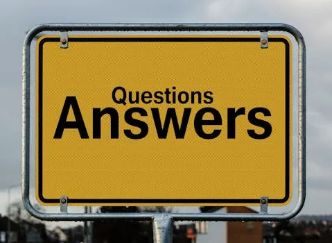 Yellow sign with text questions and answers suggesting direction in