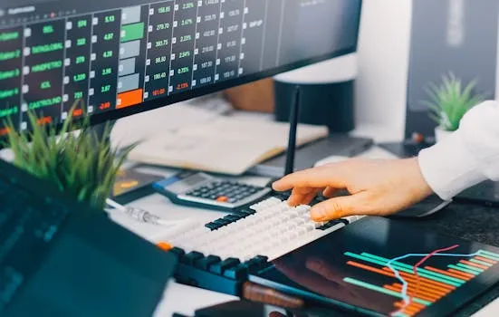 Professional workspace with trading charts and market data on screens, ideal