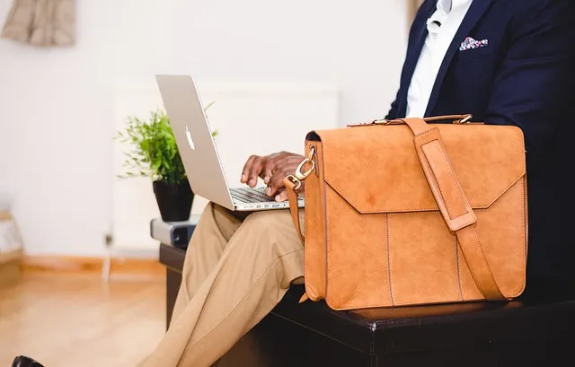 businessman, laptop, bag, chair, computer, indoors, macbook, man, satchel,