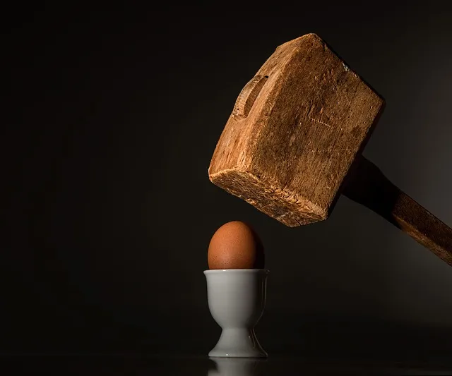egg, hammer, hit, beat, fragile, vulnerable, threaten, fear, intimidate,